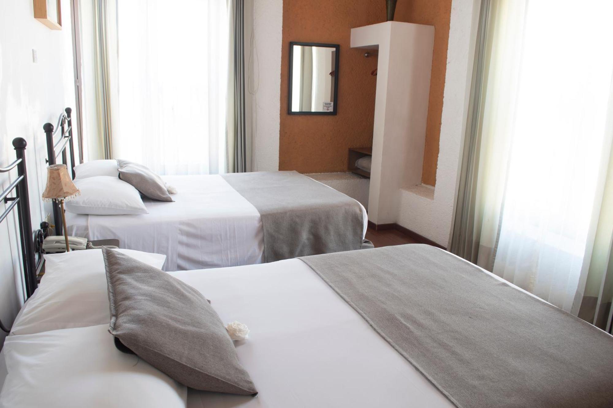 Portico Hotel & Galeria Morelia Rum bild